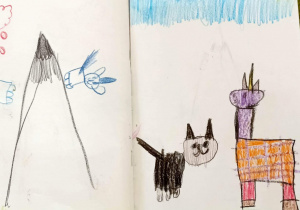 Strona z książeczki przedstawiająca kota, jednorożca i góry.