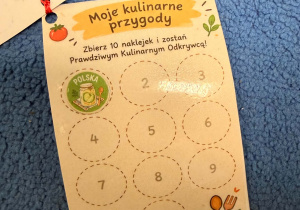 Paszport kulinarnego odkrywcy z pierwszą naklejką.